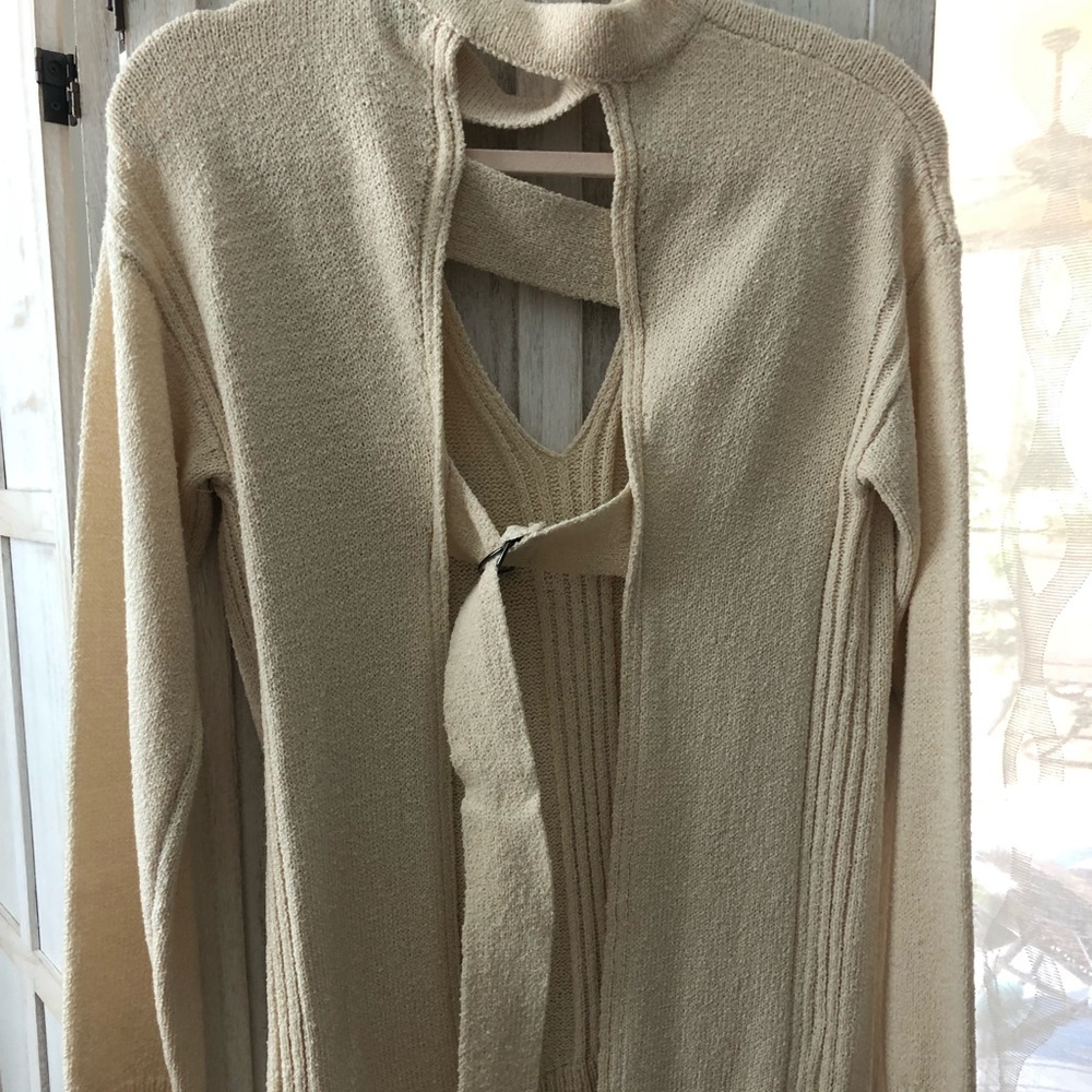 Cape top and open back sweater